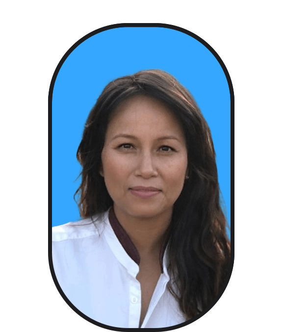 A woman looking for work wearing a white shirt and blue background.